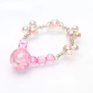Bracelet perles acryliques motif Mickey. Bonne qualité et très original. Couleurs rose.