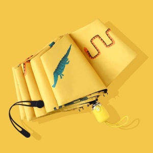 Parapluie enfant jaune avec imprimé animaux sur fond jaune