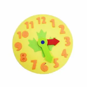 Puzzle manuel en forme d'horloge pour enfant. Bonne qualité et très pratique.