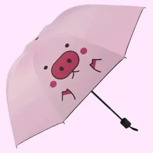 Parapluie rose à motif cochon pour fille. Bonne qualité et très pratique.