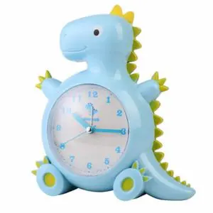Réveil enfant en forme de dinosaure bleu et vert sur fond blanc