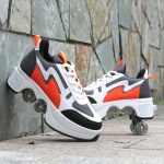 Chaussures de Skate à roulettes pour enfants en orange noir et blanc devant un mur en pierre