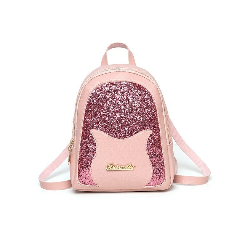 Un sac à dos pour enfant de couleur rose avec des paillettes sur fond blanc