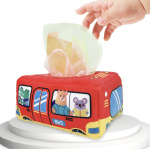 boîte à mouchoirs rouge en forme de bus avec des animaux à l'intérieur, dans laquelle un bébé met des mouchoirs en tissus