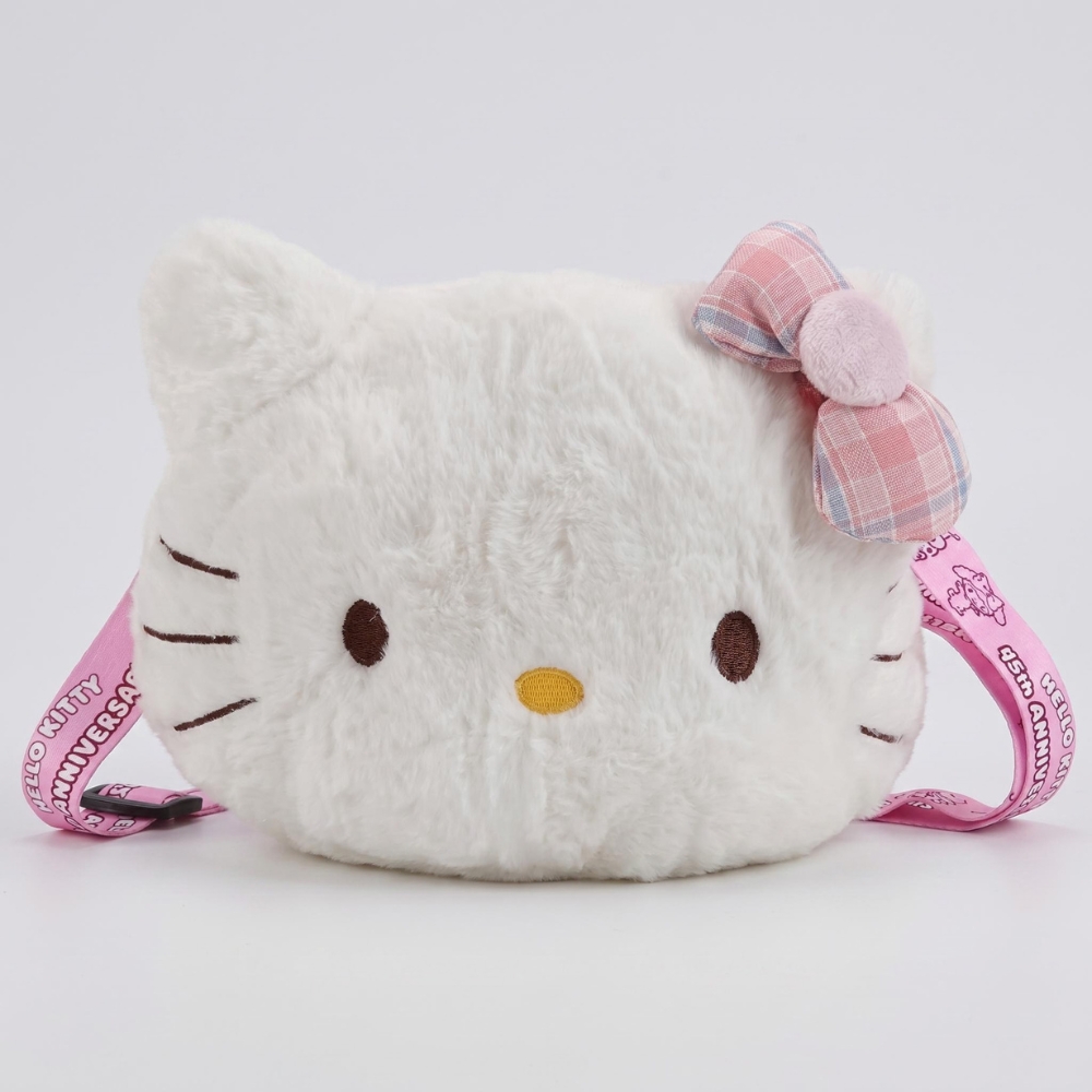 Sac Hello Kitty en peluche blanche et rose, sur fond gris