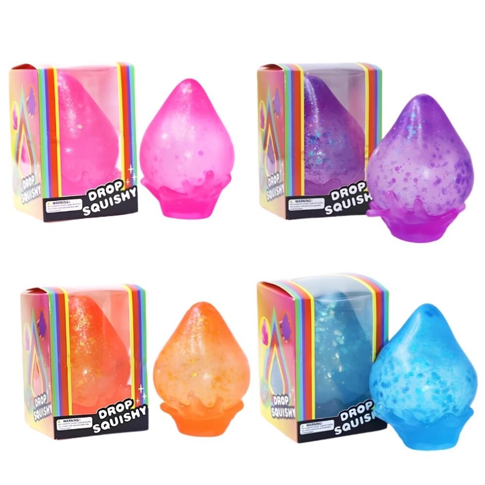 4 boites avec à côté le squishy needoh correspondant, de couleur rose, violet, orange et bleu